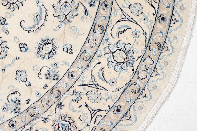 A Nain rug, diameter a. 247 cm.