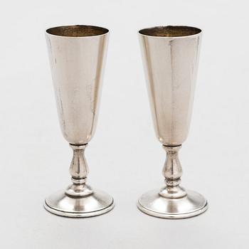 A set of six silver vodka cups, maker's mark of Vasily Kangin, Saint Petersburg, 1898-1903.