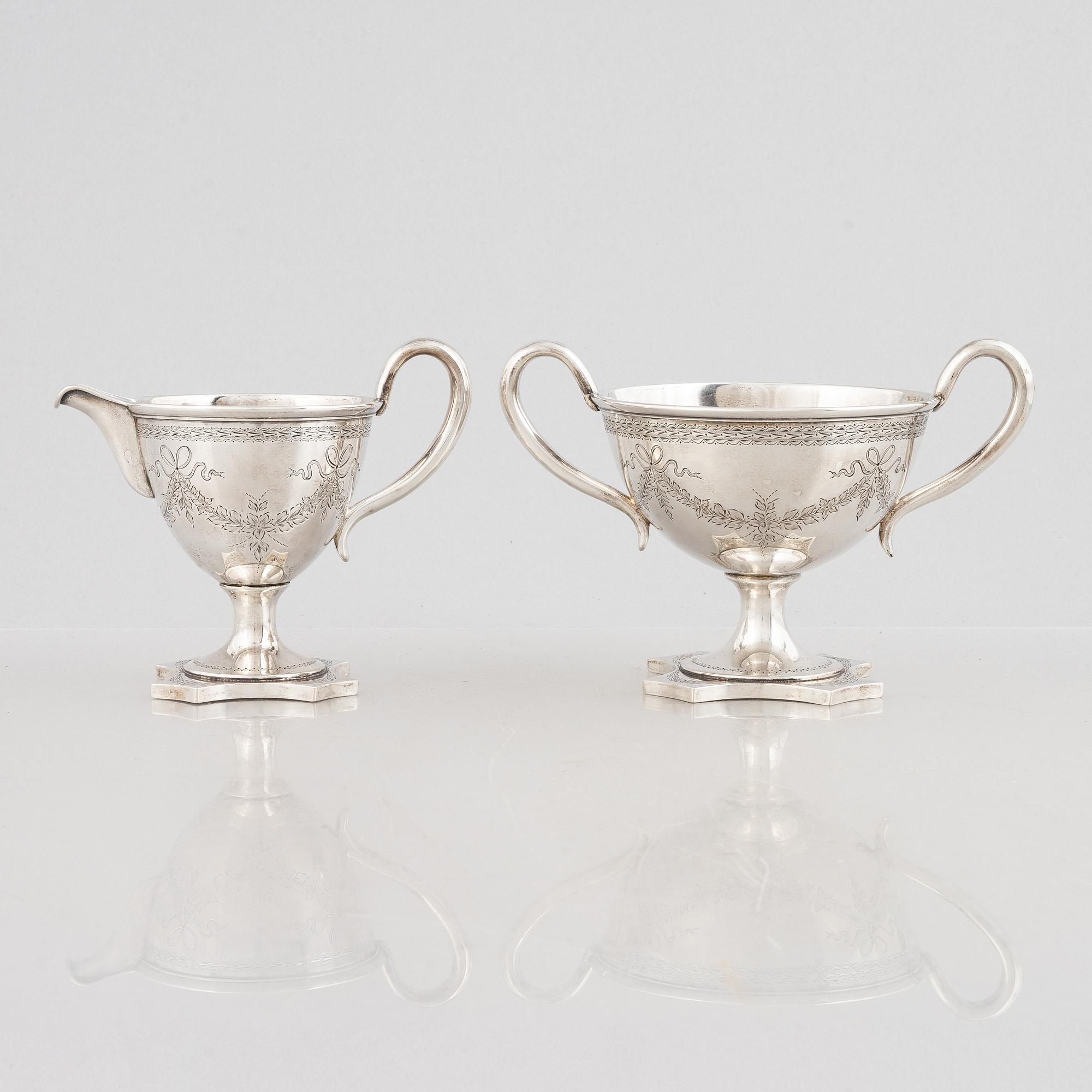 a silver sugar bowl and creamer, Denmark, 1904.