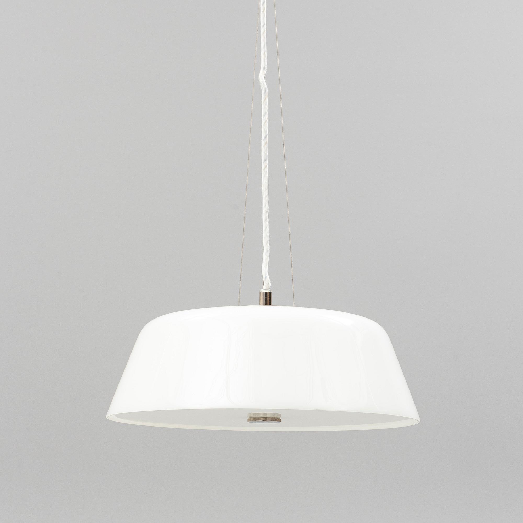 An Arne Jacobsen "Centenary Package" comprising three "Ant Chairs" and an eggshaped table, Fritz Hansen, Denmark.