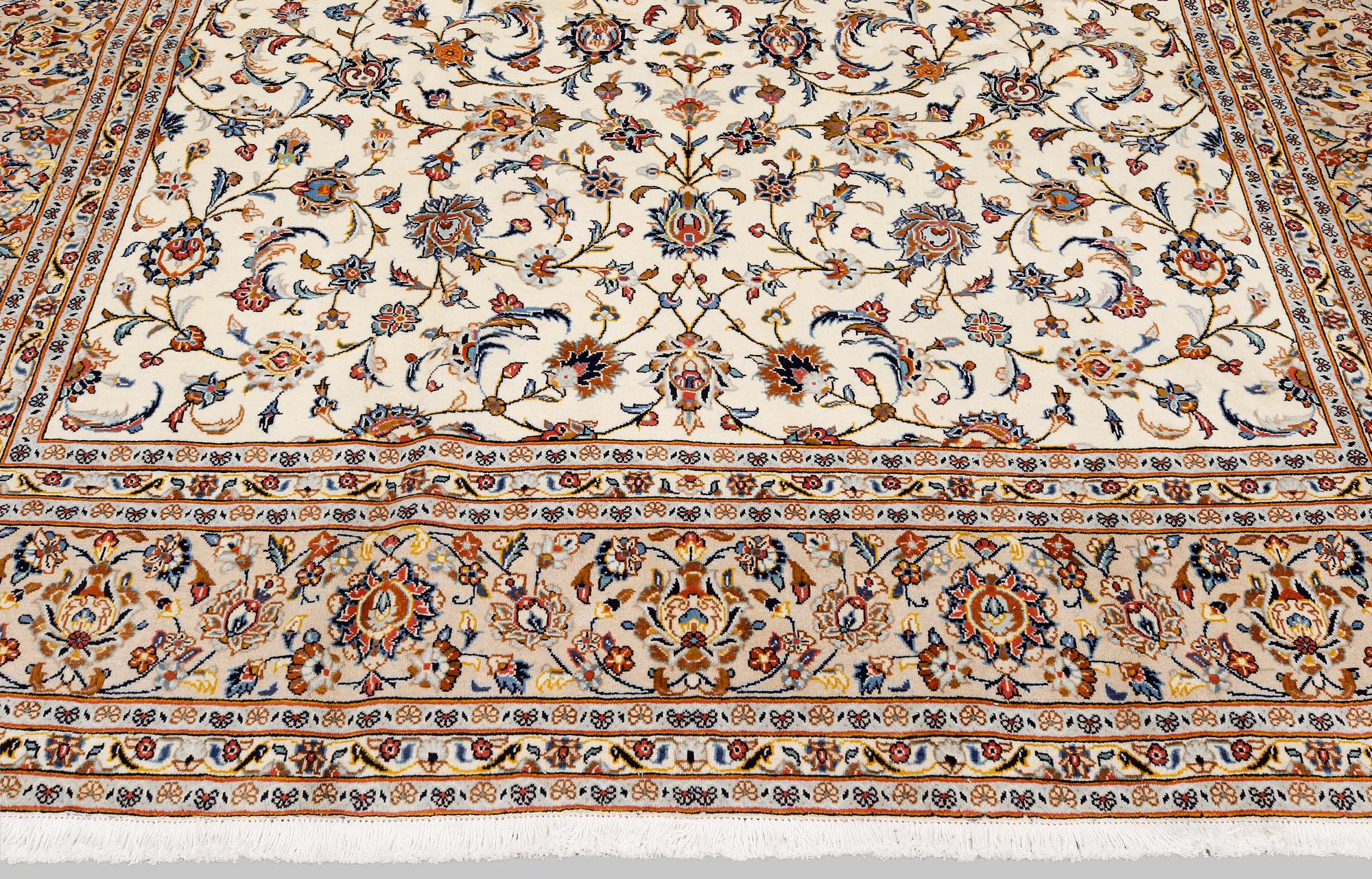 A carpet, Kashan, 362 x 245 cm.