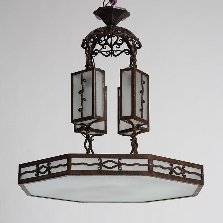 Carl Westman, attributed to, a wrought iron and frosted glass Art Nouveau chandelier, Sweden ca 1915.