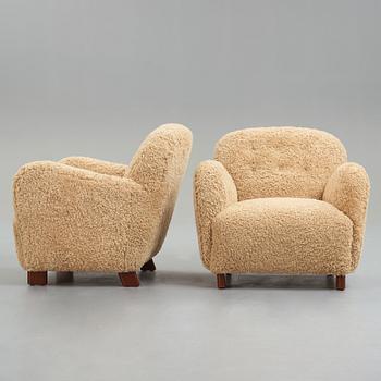 Fritz Hansen, a pair of "1565" upholstered easy chairs for Fritz Hansen, Denmark 1940's.