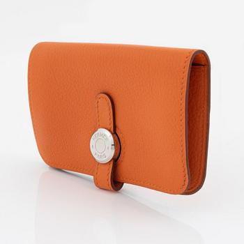 Hermès, a orange leather 'Dogon' wallet, 1998.