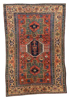 292. A rug, semi-antique Karadja, ca 216 x 140-144 cm.