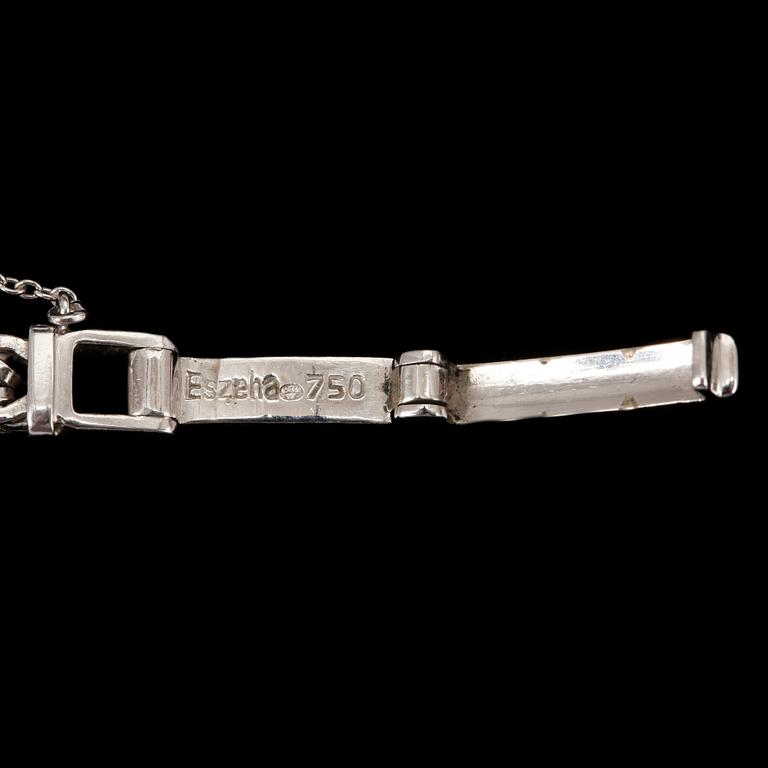 DAMARMBANDSUR, vitguld 18K, med 22 diamanter. Baume & Mercier, Geneve. Svensk importstämpel. Tot ca 21 gram.
