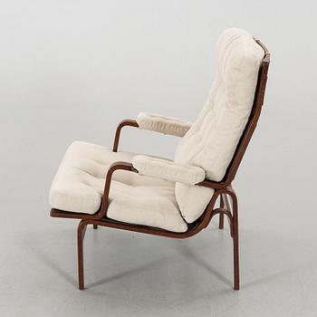 AN ARM CHAIR, By Bruno Mathsson Dux, late 20th century,