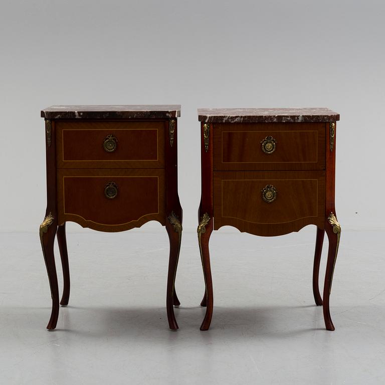 A pair of mid 20 th century mahogany bedside tables.