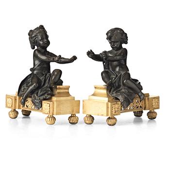 158. A pair of Louis XVI late 18th century fire dogs.