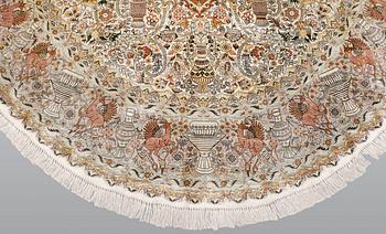An oval pictoral silk carpet, ca 273 x 180 cm.