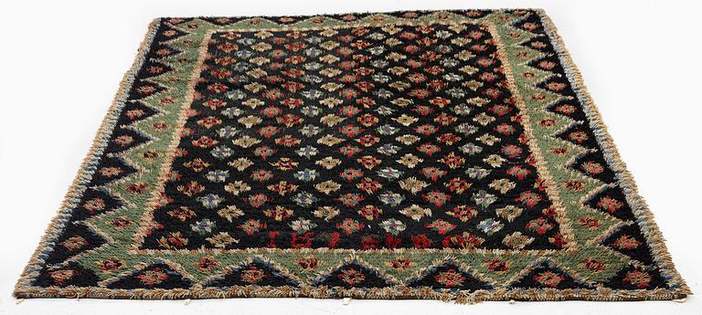 A Knotted pile (rya), c. 200 x 140 cm, Finland, dated 1849.