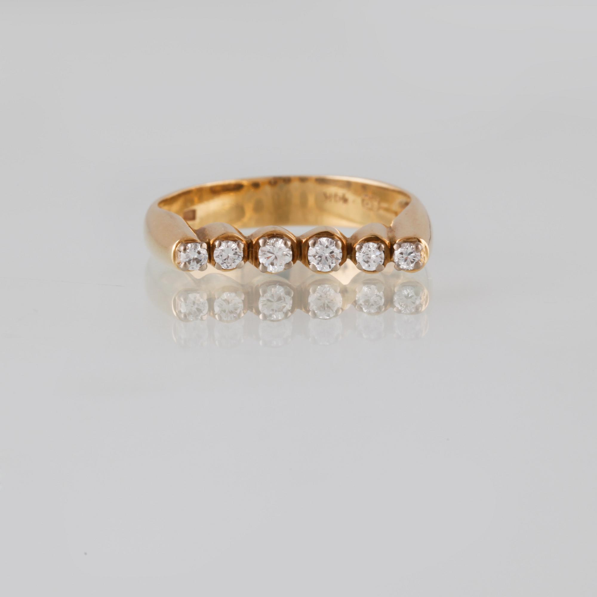 RING, 14K guld med 6 briljantslipade diamanter, utländska stämplar. Vikt 3,4 gram.