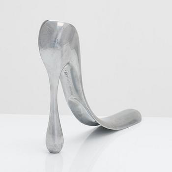A metal shoe horn by Manolo Blahnik, 2000s.