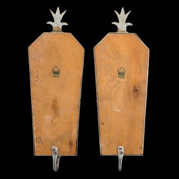 A pair of Art Deco mirror wall sconce from the 1930s.