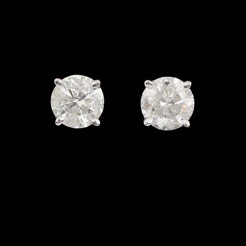 ÖRHÄNGEN, 1 par, 14 k vitguld, solitära briljantslipade diamanter tot ca 0.63 ct.