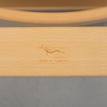 An "Mina" armchair by Bruno Matsson.