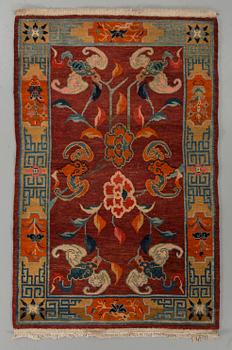 A semiantique Chinese Baotou carpet ca 147 x 91 cm.