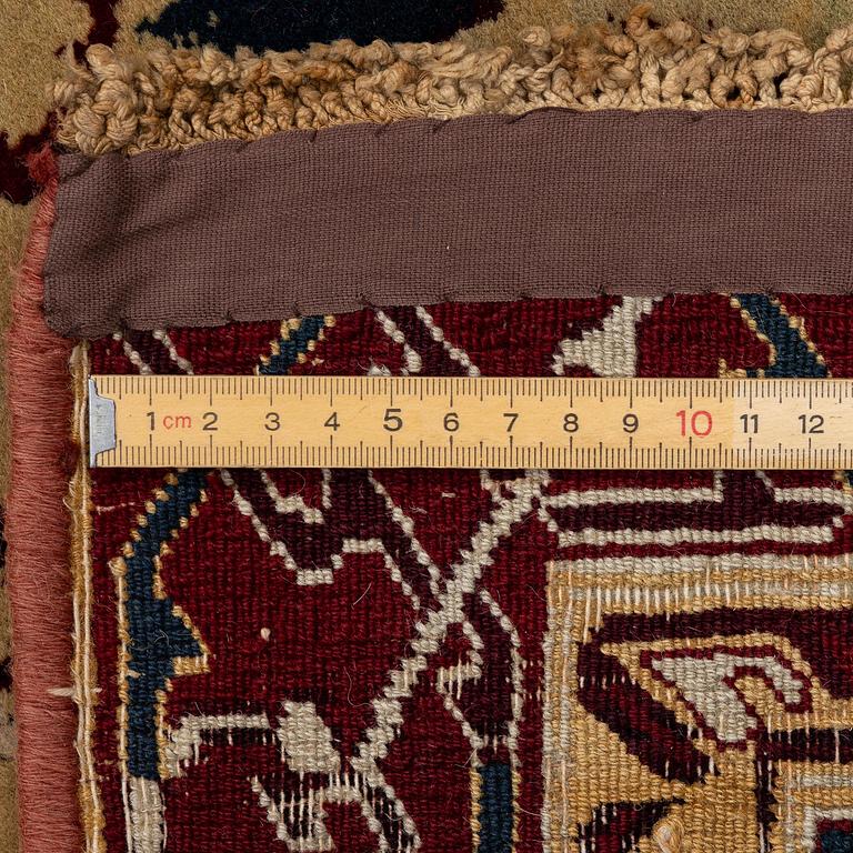 An Antique Agra carpet of 'Dragon Lattice' design, North India, 375 x 298 cm.