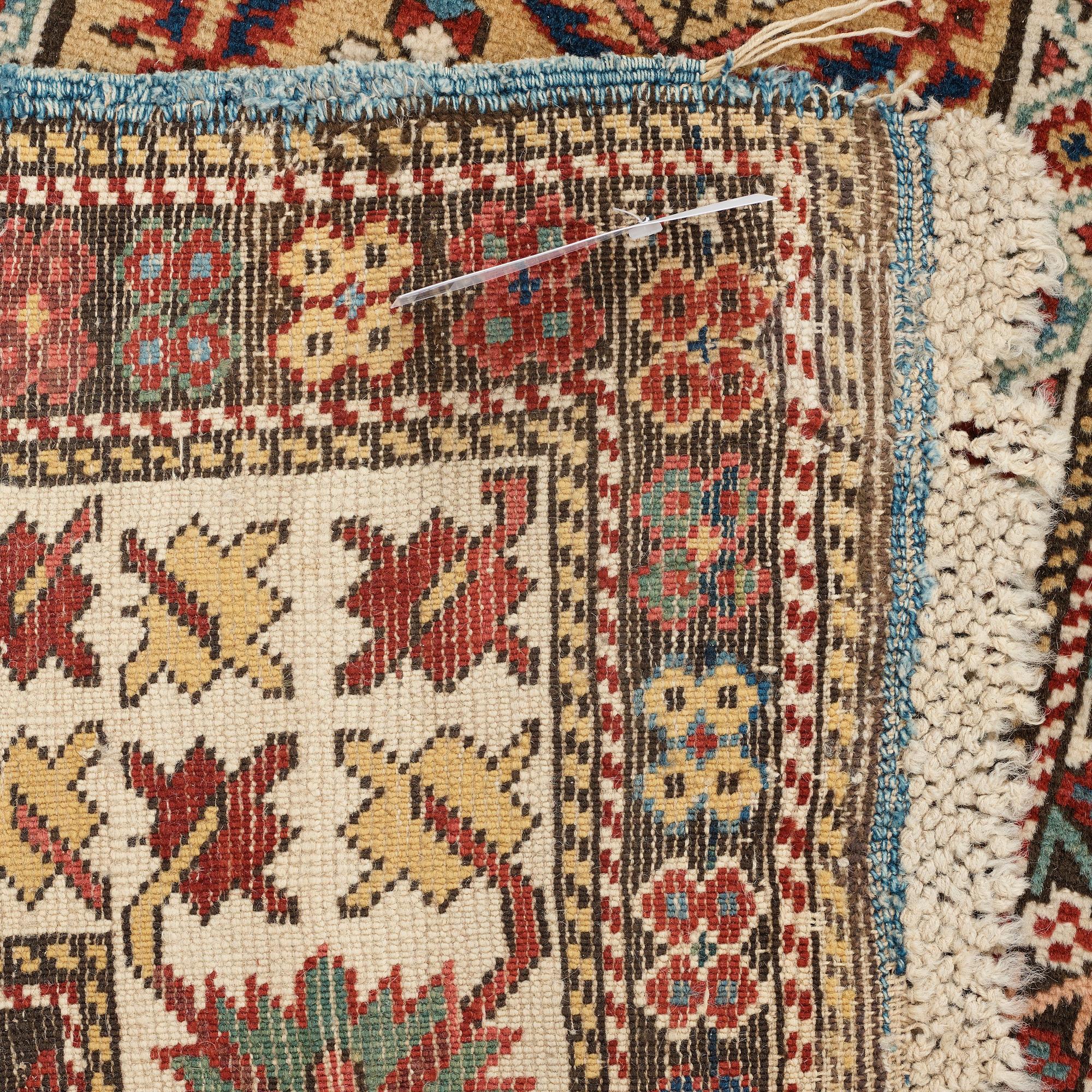 MATTO, an antique Kuba, ca 289,5 x 97 cm (as well as the ends with 1 cm light blue soumak).