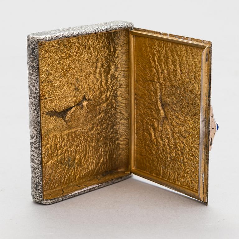 A Russian, early 20th century silver cigarette case, samorodok technique.