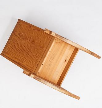 Nordiska Kompaniet, a Swedish Modern stained pine 'Lovö' rocking chair.