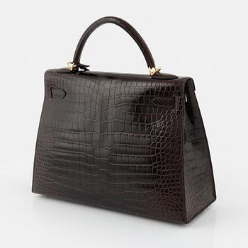 Hermès, a Crocodile Porosus 'Kelly 32' handbag, 2009.