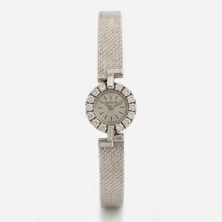 White gold, baguette- and brilliant cut diamond Corum ladies watch.