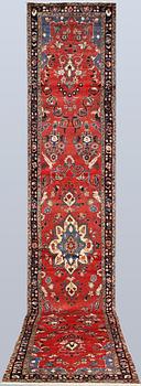 A Figural Hamadan runner carpet, 515 x 90 cm.