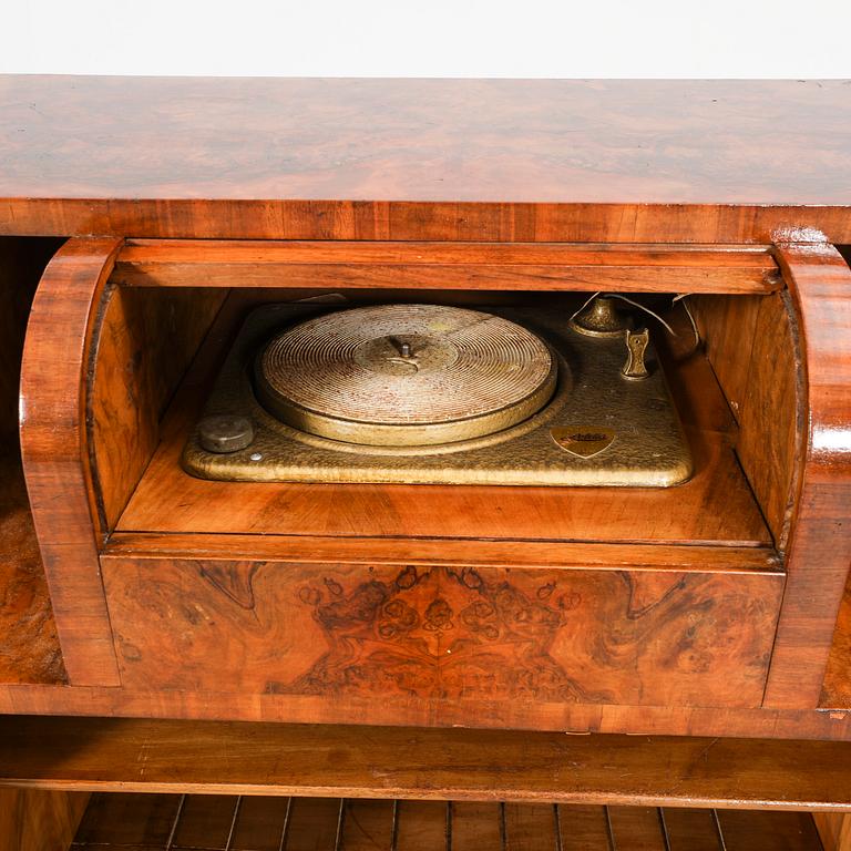 An Art Deco walnut cabinet/record player first half of the 20th century.
