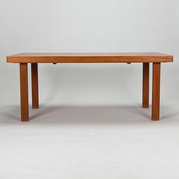 Carl Gustaf Hiort af Ornäs, a mid-20th Century dining table and eight chairs for  för HMN Huonekalu Mikko Nupponen.