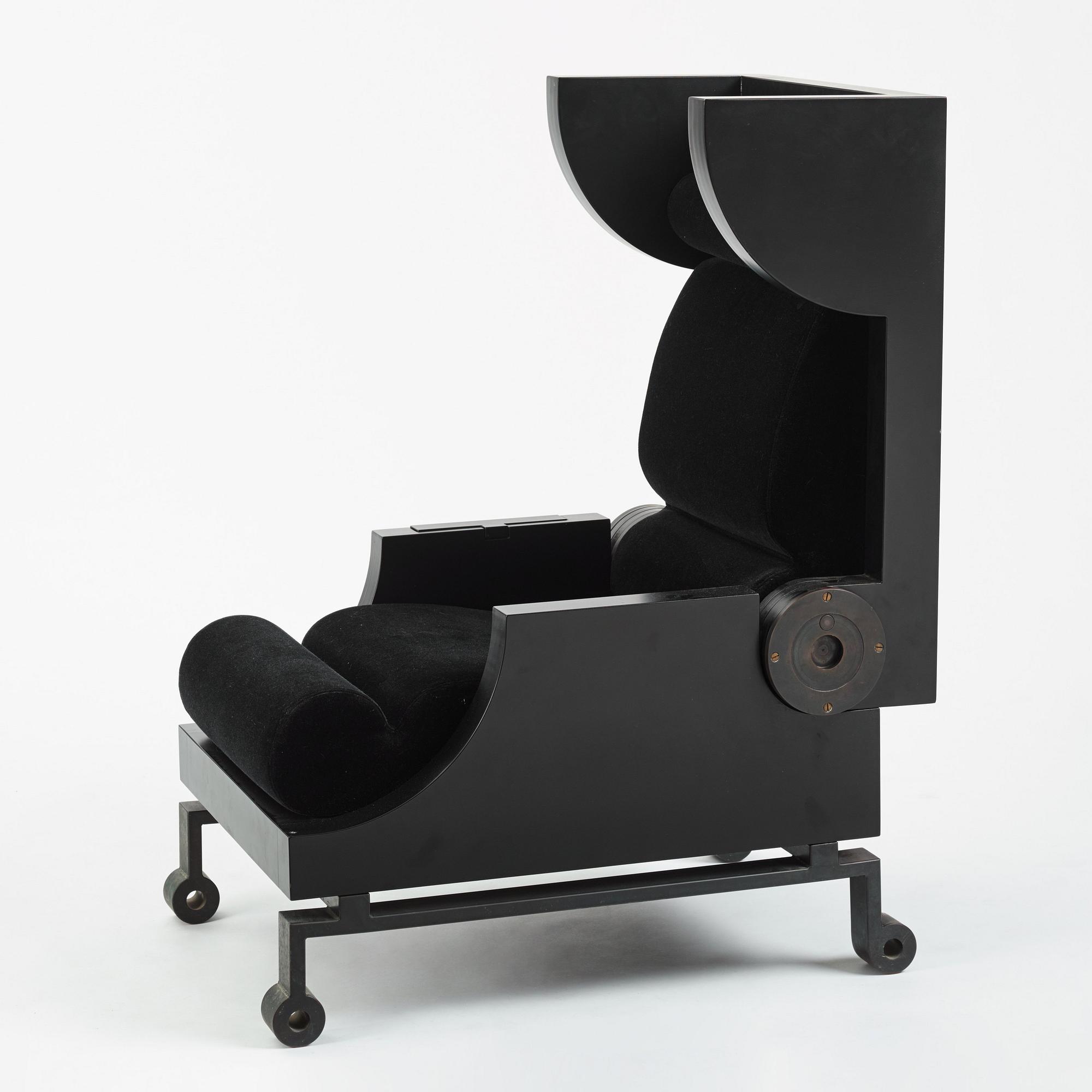 Alexander H Damsbo & Henrik Ingemann Nielsen, a "HC-Andersen Chair" armchair/table, ed. 3/49, Källemo, post 2005.