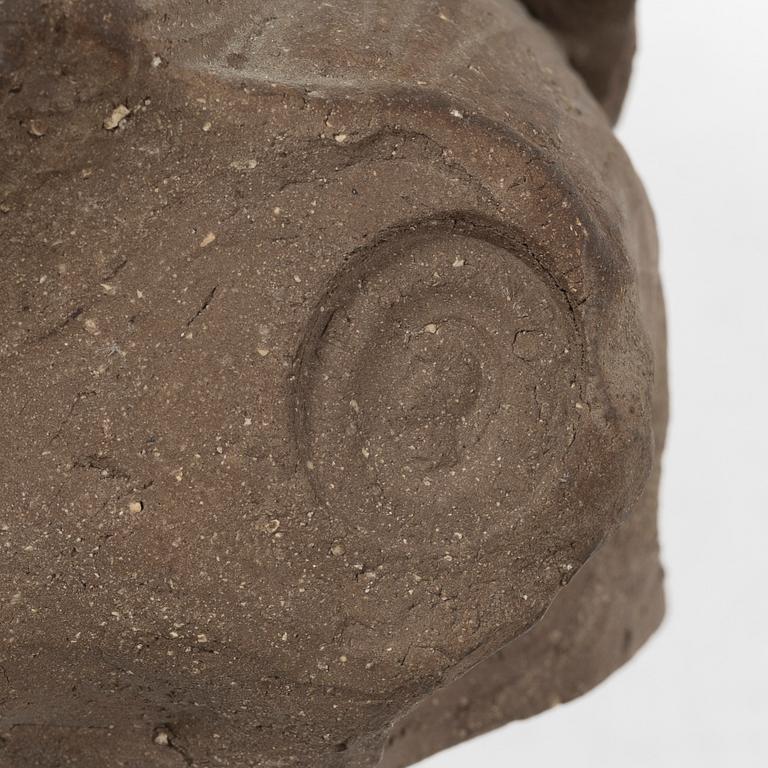 Tyra Lundgren, a stoneware sculpture of a woodpecker, executed in her own studio.