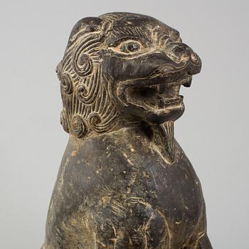 A stone sculpture of a mythical beast, China, 20th Century.