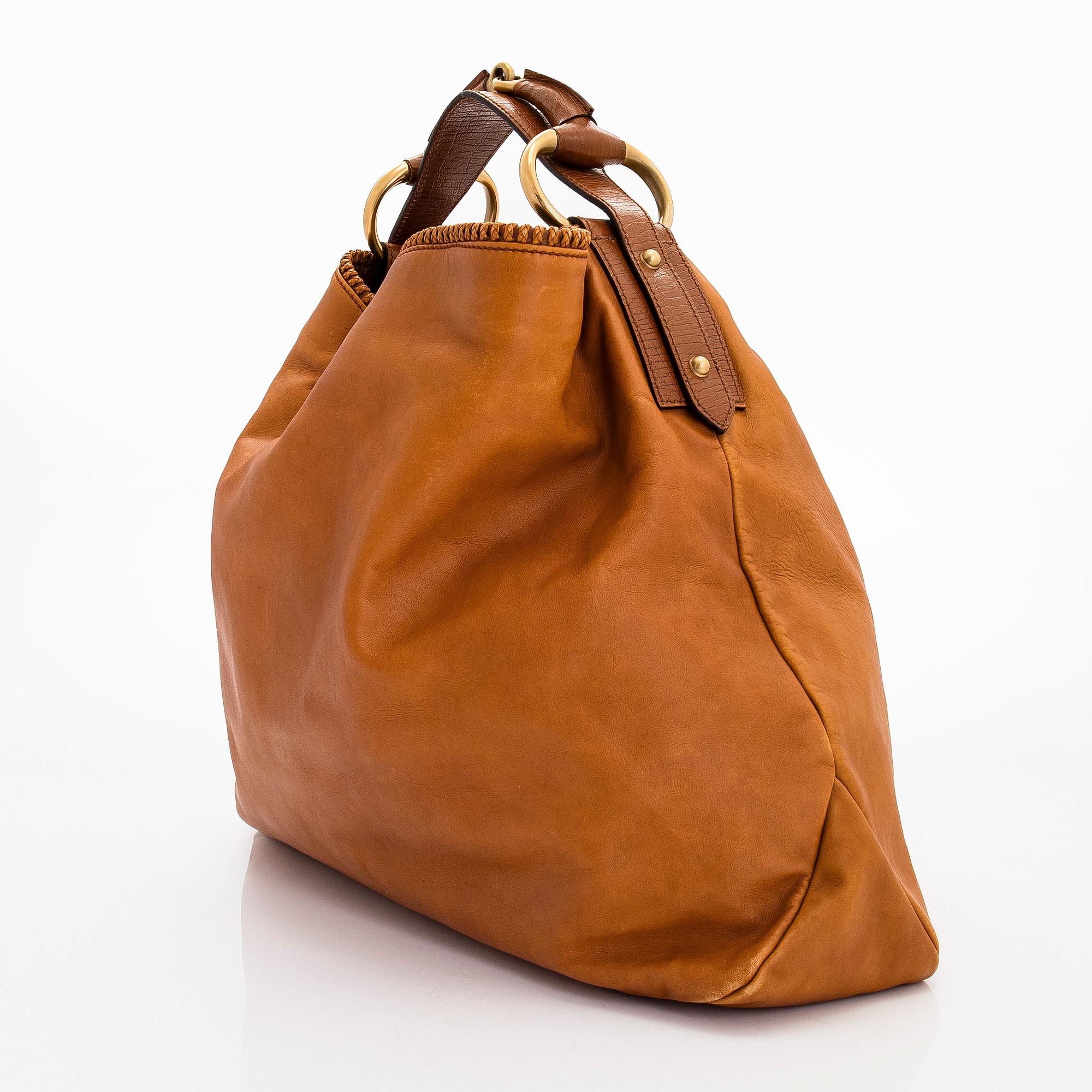 Gucci, a 'Horsebit Hobo' bag.