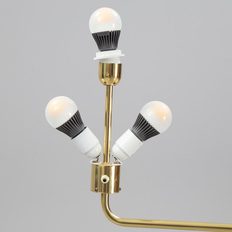 A pair of brass and leather floor lights, Örsjö Industri, 21st century.