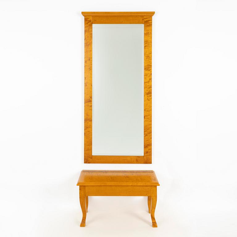 A mirror with console table, early 20th century.