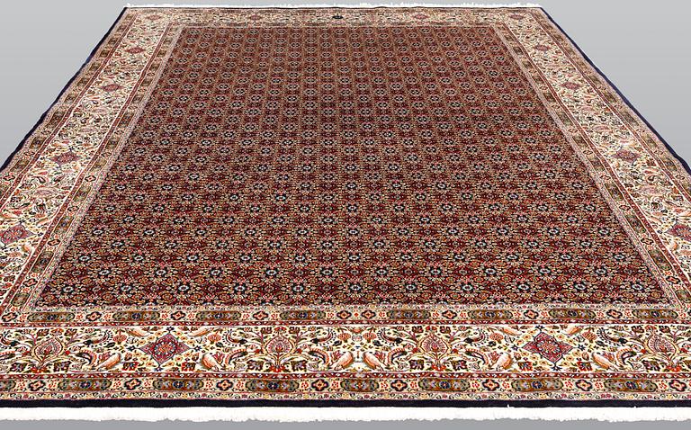 A Moud part silk carpet, signed, 335 x 250 cm.