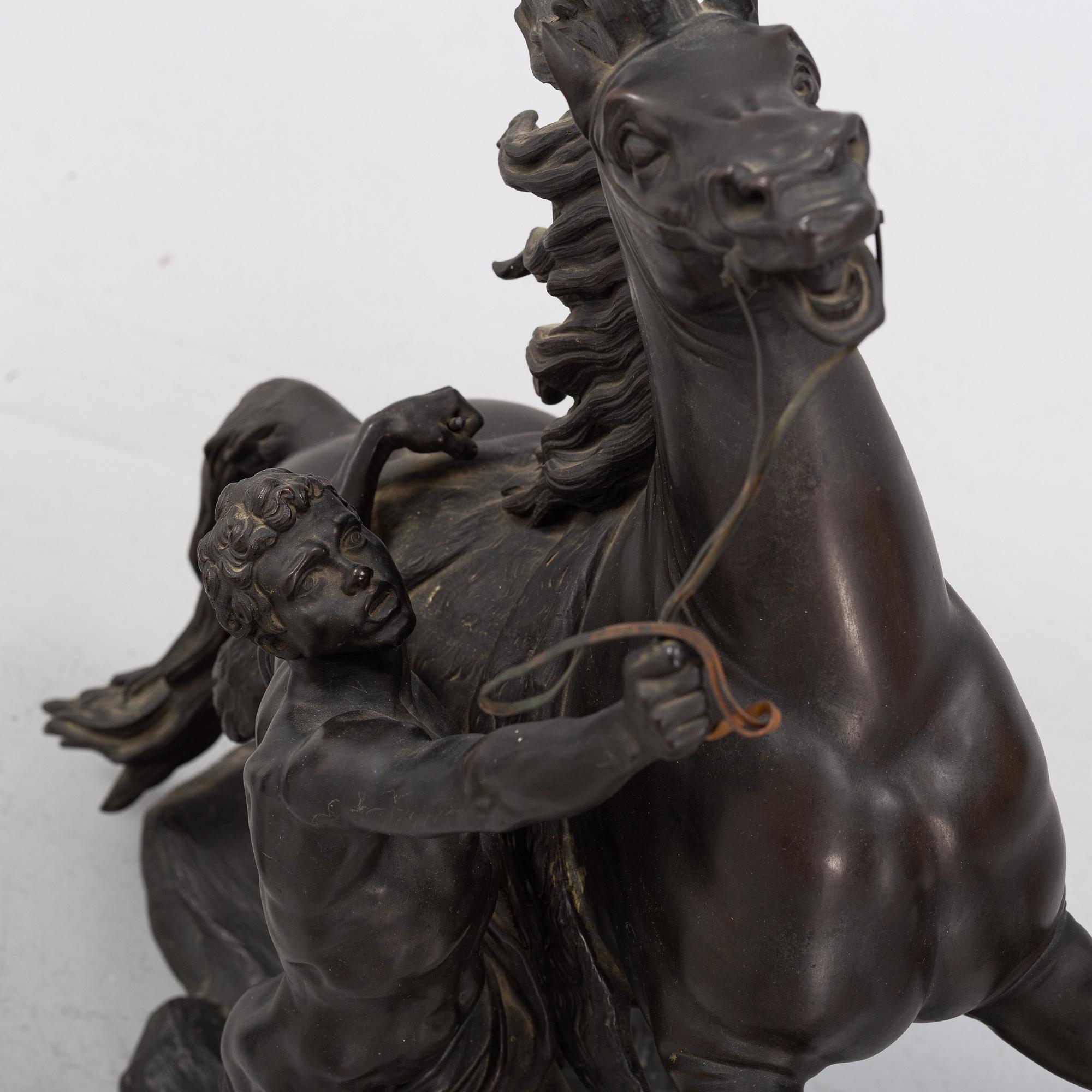 Guilliaume Coustou, after, a pair of bronze sculptures.