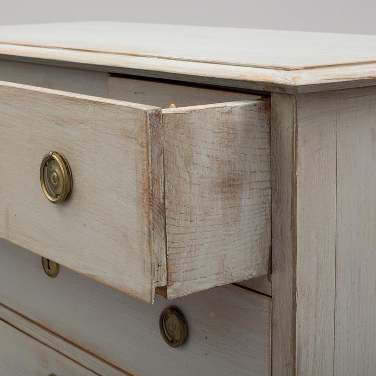 A mid 19th century painted chest of drawers.