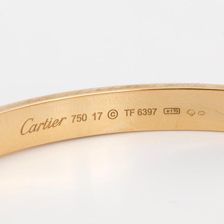 An 18K gold Cartier 'Love' bangle.