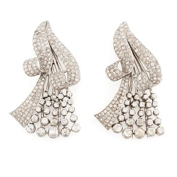 596. A pair of platinum brooches with old-cut, round brilliant-cut and single-cut diamonds.