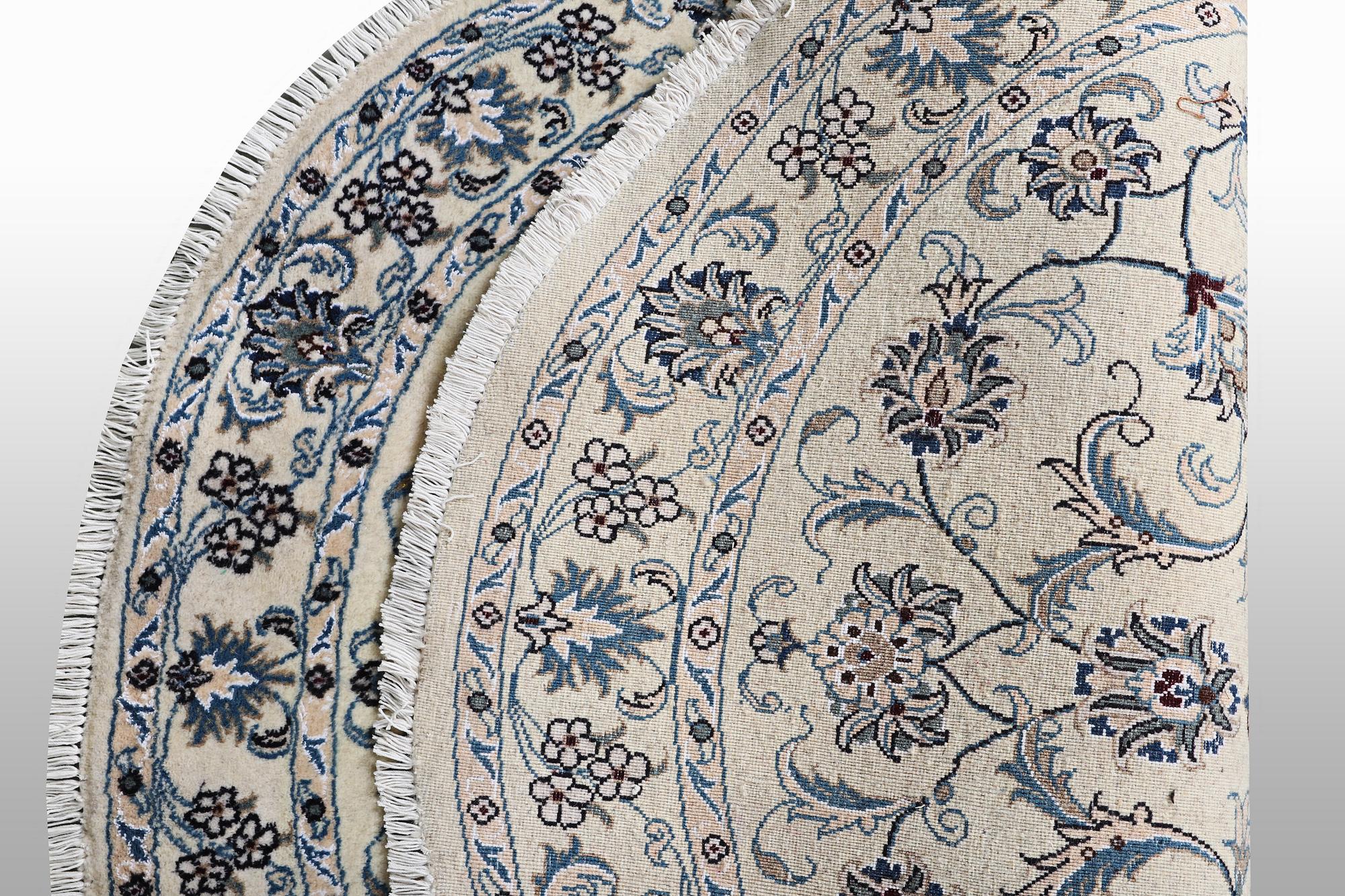 A rug, Nain, part silk, ca 146 x 146 cm.