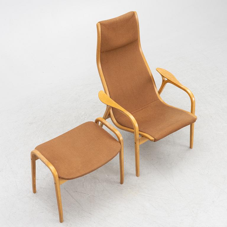 Yngve Ekström, a 'Lamino' easy chair and a foot stool, Swedese.