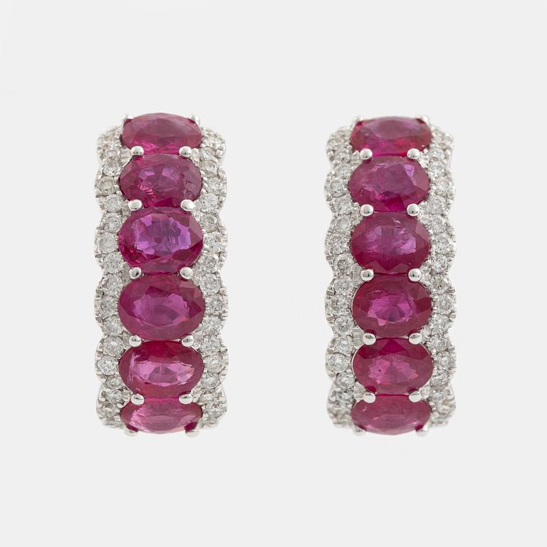 Earrings with rubies and brilliant-cut diamonds.
