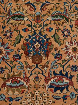 A carpet, semi-antique Tabriz, ca 404 x 292 cm.