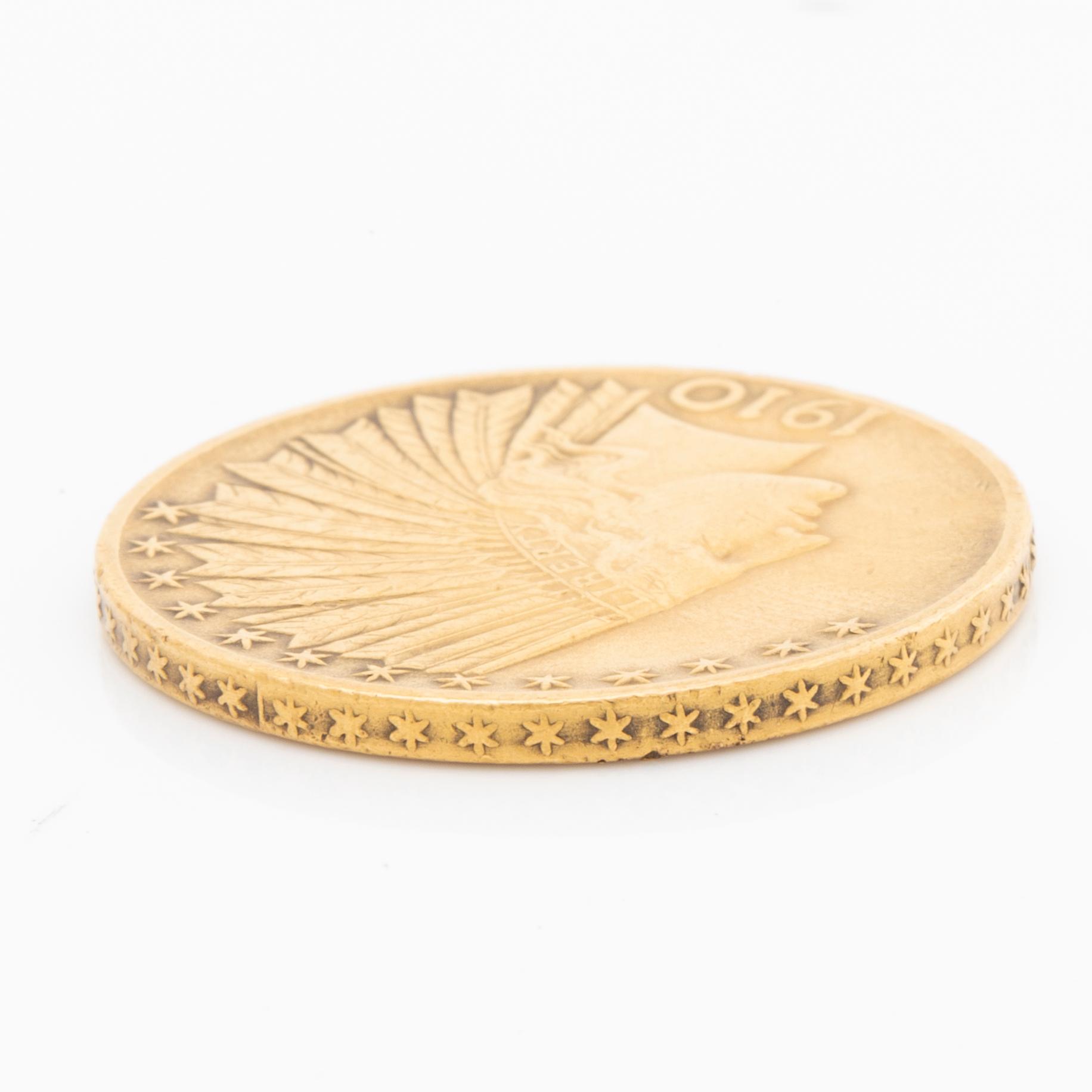 A 10 dollars Indian Head gold coin from 1910.
