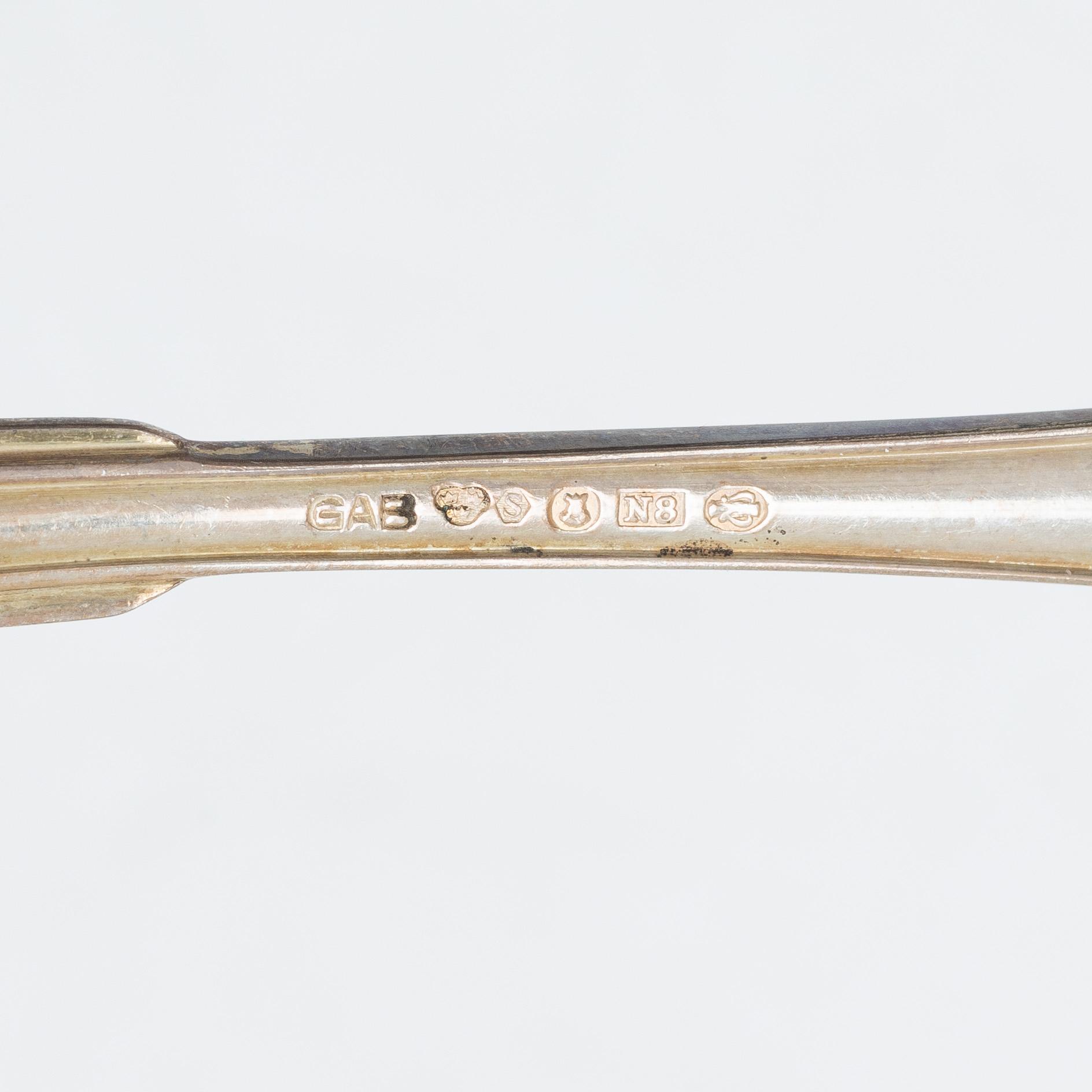 A 36 piece silver cutlery service, model Svensk Spets, mostly CG Hallberg, 1930s.