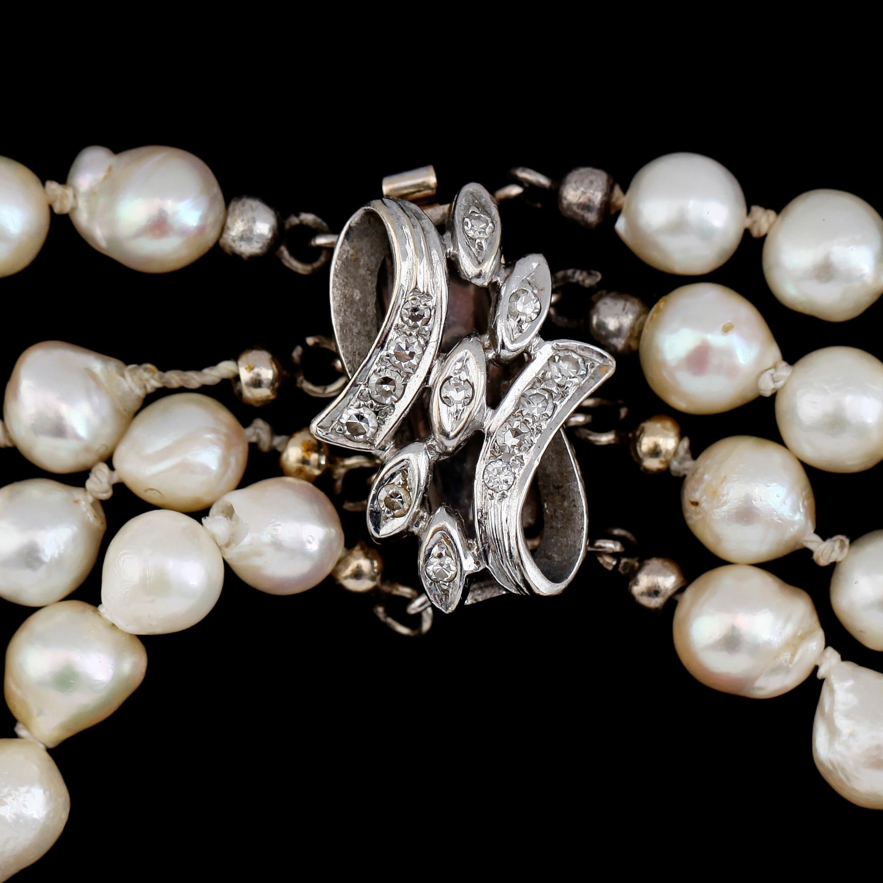 ARMBAND, 18K vitguld, odlade pärlor, diamanter, 1900-talets mitt.