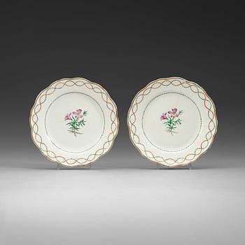 387. A pair of famille rose armorial dishes for Claes Alströmer, Qing dynasty, Qianlong (1736-95), ca 1770.