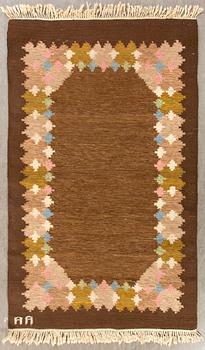 A signed Swedish flatweave carpet ca 207 x 137 cm.